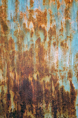 Rusty iron. The texture of the old rusty metal sheet. Closeup.