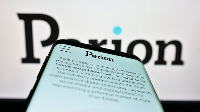 Stuttgart, Germany - 12-10-2022: Smartphone with website of Israeli company Perion Network Ltd. on screen in front of business logo. Focus on top-left of phone display.