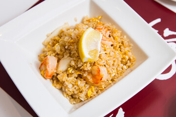 Asian combo plate with premium shrimps served with rice or noddles.
