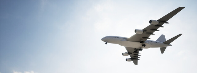 Conceptual flying white passenger jetliner or commercial plane after take off rising over a beautiful sky background. 3D illustration for jet transportation, travel industry or modern freedom concept