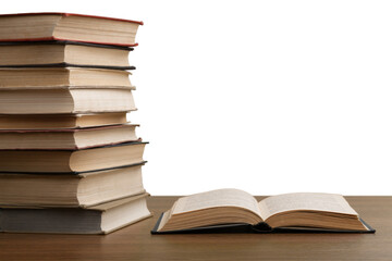 Book stacking and an open book on the desk