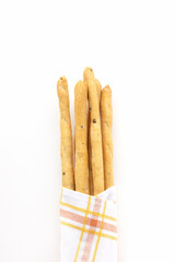 Italian Grissini Breadsticks with olive pieces on white background
