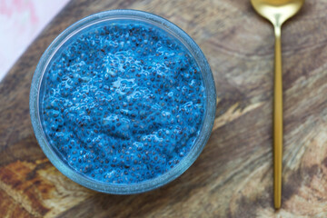 Blue spirulina chia seed pudding bowl. Superfood and vegan concept