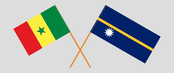 Crossed flags of Senegal and Nauru. Official colors. Correct proportion