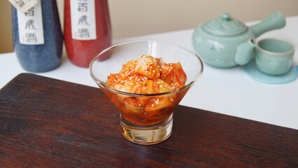 Bowl with kimchi salad. Kimchi is a Korean dish made from a fermented preparation whose basic ingredient is Asian cabbage or Brassica pekinensis cabbage.