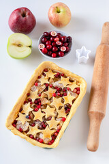 Apple Cranberry Pie. Crispy, sweet apples paired with tart cranberries on a delicate flaky pie crust.