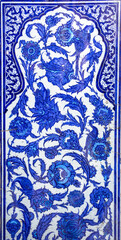 Blue tile panel of the mythical Phoenix bird and flowers motif in Topkapi Palace, Istanbul, Turkey.