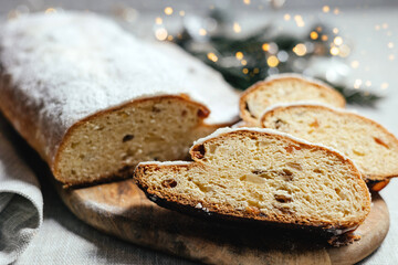 Christmas stollen on a gray background with highlights.