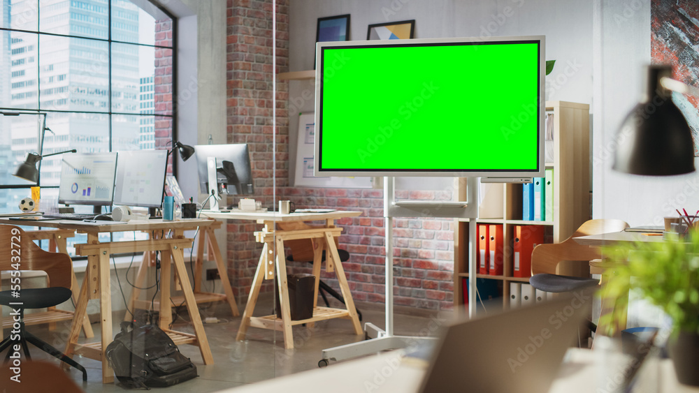 Fototapete empty conference room for team meetings in modern creative agency with art on walls and desks with c