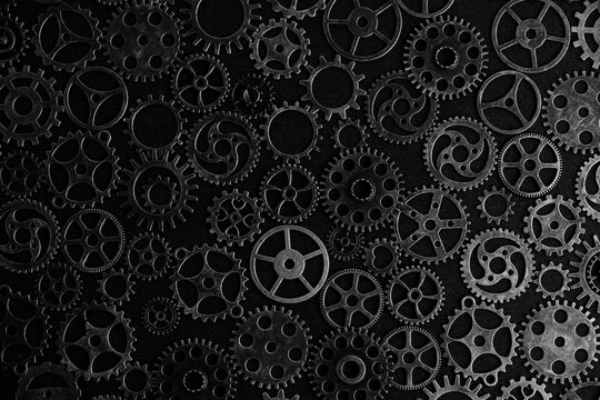 Black and white background with metal gears.