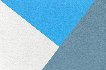 Texture of craft white, blue and cool gray shade color paper background, macro. Vintage abstract cerulean cardboard
