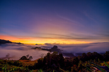 Jabo view point with fog and twilight in morning at Jabo village, Mae Hong Son, Thailand