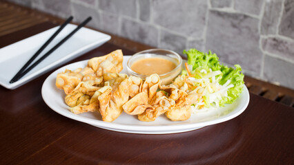 Fried wan tan dumplings. Won ton is a very thin and stuffed dough that is very common in Chinese cuisine.