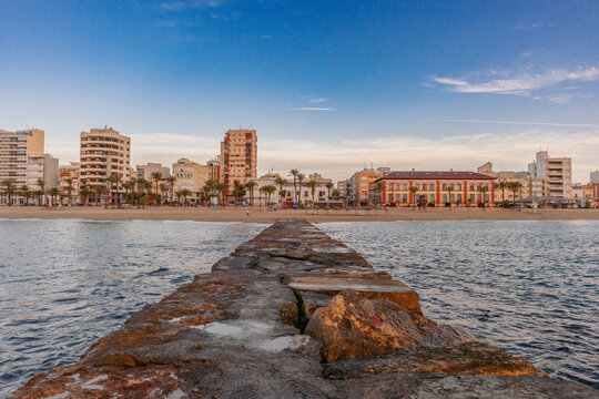 Beautiful sunrise from the jetty of the Fort&iacute; beach, in Vinaros, Castellon.