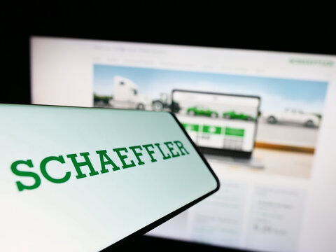 Stuttgart, Germany - 12-11-2022: Cellphone with logo of company Schaeffler Technologies AG Co. KG on screen in front of business website. Focus on center of phone display.