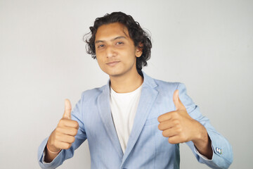 smiling businessman standing in front of white background