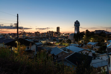 Early evening sunset glow over neighborhood in small city 