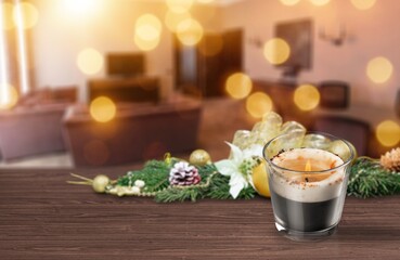 Cozy holiday card with aroma candle on desk