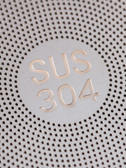 Stainless steel tea strainer infuser close up. Tool for thermos or coffee mug with spill proof lid. Mockup.
