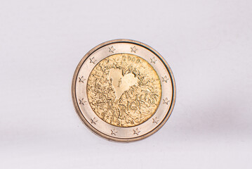 A collection of two euros commemorative coins. In a row, copy space. Concept of numismatic, finance, european currency