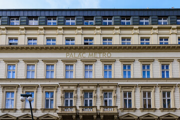 Facade of the house of classical European architecture of the old cozy tourist city. Background