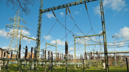 transformer substation, in the photo substation elements in the background blue sky