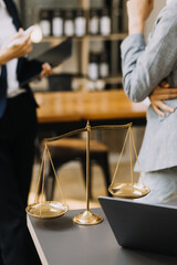 Male lawyer working with contract papers and wooden gavel on tabel in courtroom. justice and law ,attorney, court judge, concept.