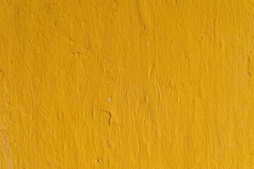 Abstract yellow cement wall texture and background. Modern grafitty wallpaper. A wall have some grunge effects and lines