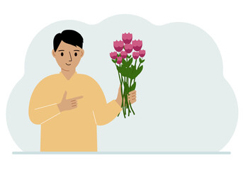 A man is holding a large bouquet of flowers. The concept of a holiday, congratulations, romance or gift.