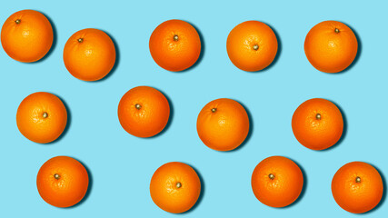 Background with oranges. Many oranges on a blue background. Banner.