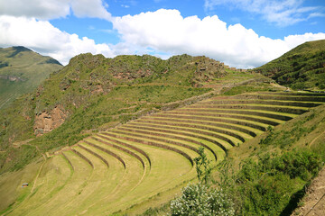 Impressive Inca agricultural terraces with the ancient ruins at Pisac archaeological complex, Sacred Valley of the Inca, Cusco region, Peru, South America - obrazy, fototapety, plakaty