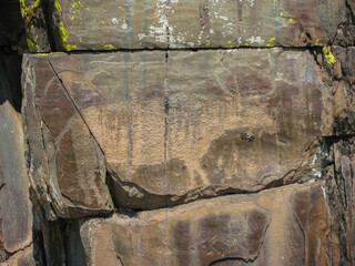 Ancient rock paintings in the Altay Mountains, Siberia, Russia. Petroglyphs of Altay.