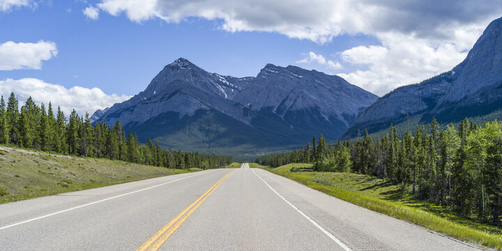 Road through the rugged Canadian Rocky Mountains; Cline River, Alberta, Canada