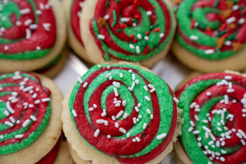 Frosted Christmas sugar cookies, homemade with green and red swirled buttercream frosting