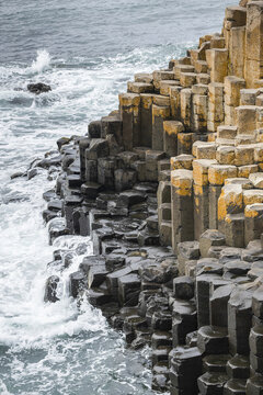 The Giant's Causeway is an area of about 40,000 interlocking basalt columns, the result of an ancient volcanic fissure eruption, Northern Ireland; Bushmills, Ireland