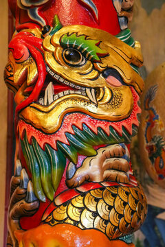 Colourful artwork in a Buddhist Chinese Temple; Udon Thrani, Thailand