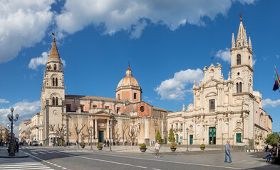 Fototapeta na wymiar ACIREALE, ITALY - APRIL 11, 2018: The Duomo (Maria Santissima Annunziata) and the church Basilica dei Santi Pietro e Paolo.