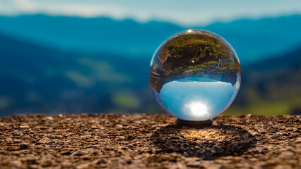 Crystal ball alpine landscape shot at the famous Jochpass-Kanzel, Bad Hindelang, Allgaeu, Bavaria, Germany