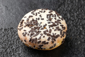Sweet white Donut with chocolate chippings. Sweet food