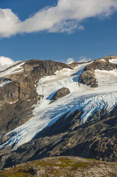 Harding Icefield Trail with the Kenai Mountains and an unnamed hanging glacier in the background, Kenai Fjords National Park, Kenai Peninsula, South-central Alaska; Alaska, United States of America