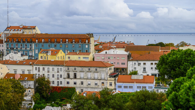 Overlooking the city of Lisbon and the Tejo River from millennium-old walls of St. George's Castle; Lisbon, Lisboa Region, Portugal