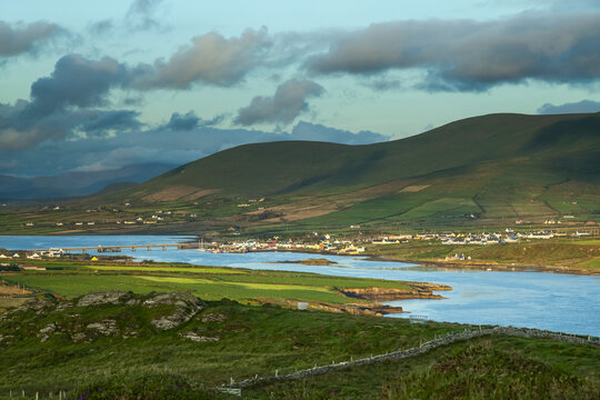 View of the coastline of Valentia Island on the Wild Atlantic Way with the Maurice O'Neill Memorial Bridge from Portmagee crossing over to the island; Valentia Island, County Kerry, Ireland
