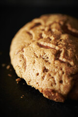 Whole wheat bread on black background	