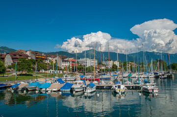 Fototapeta na wymiar Marina in Vevey, Switzerland filled with sailboats.