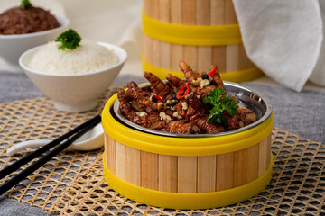 CHICKEN FEET With BEAN SAUCE with chopsticks served in dish isolated on table top view of singapore food