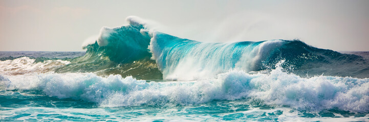 Tropical ocean wave crashing and splashing, Na Pali Coast; Kauai, Hawaii, United States of America