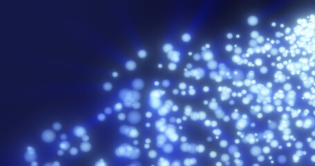 Abstract flying small round blue glowing particles of bokeh and glare with shiny energetic magical glowing rays on a dark background. Abstract background