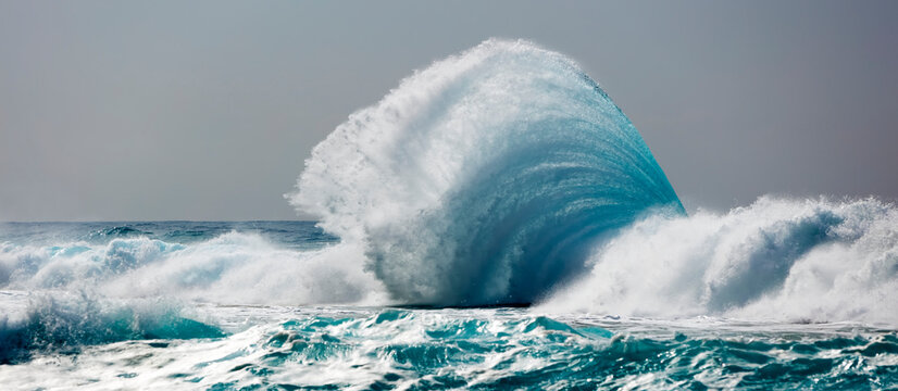 Tropical ocean wave crashing and splashing, Na Pali Coast; Kauai, Hawaii, United States of America