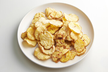 dry potato chips on a plate