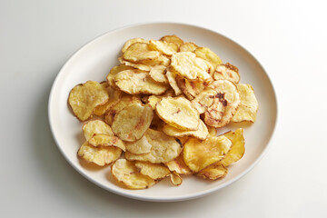 dry potato chips on a plate	